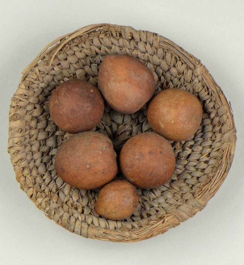Basket containing six persea fruits, about 2055 - 1650 BC