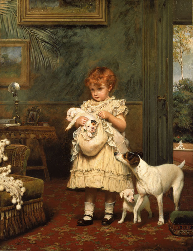 small girl in a smart dress, holding a puppy, with a dog and another puppy standing by her