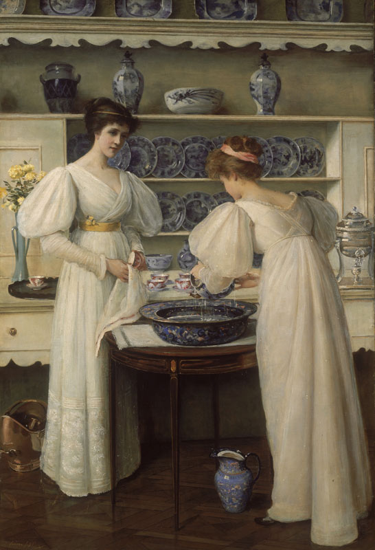 Women washing up at a large blue and white bowl on a table, with similar patterned crockery on shelves behind them