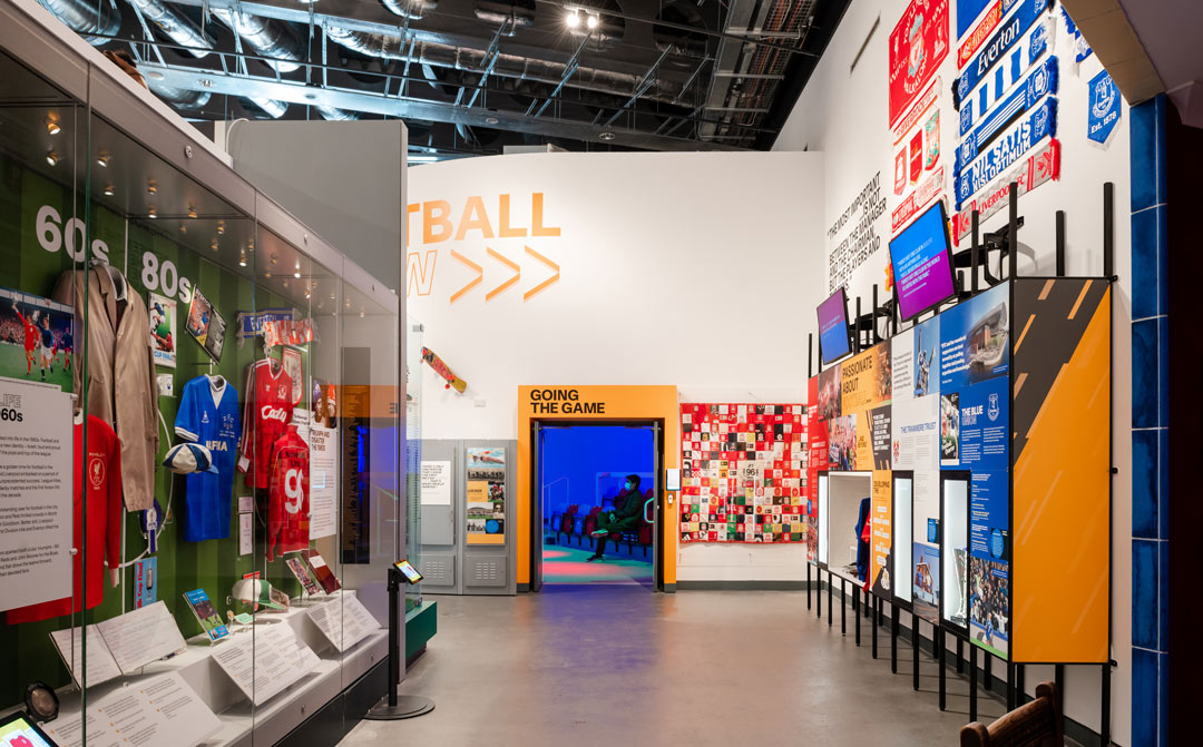 Football scarves, flags, shirts and other memorabilia in museum display