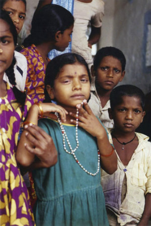 Young Indian girl wearing necklace