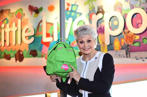 Photo of Angela Rippon holding When I was little backpack