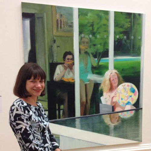 Caroline Walker (artist) standing in front of 'Consulting the Oracle' painting
