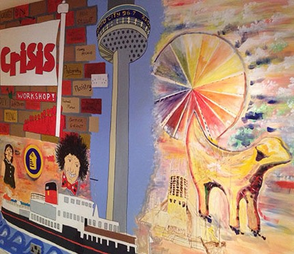 Detail of the mural showing a lambanana, the radio city tower the ferry and Ken Dodd.