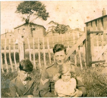 Maureen and Cyril Dixon with their father George.