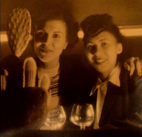 This photograph shows two Afro-German women who survived Nazi persecution in a bar which Black survivors set up in Berlin after the war. They both featured in last year's lecture on Black Germans and the Holocaust.