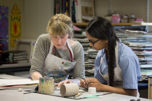Marie Canning working with a student from Prenton High School for Girls