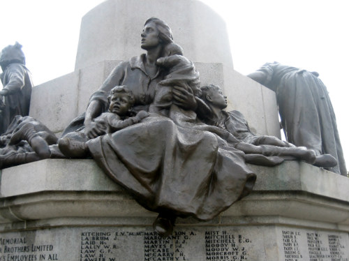 Bronze figures of a mother and children on the Port Sunlight War Memorial.