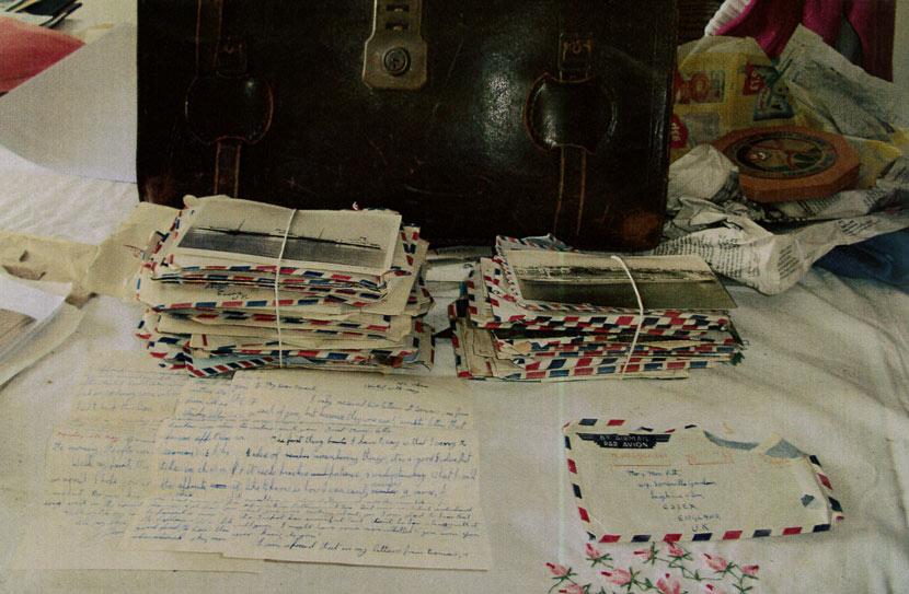 bundles of letters in air mail envelopes