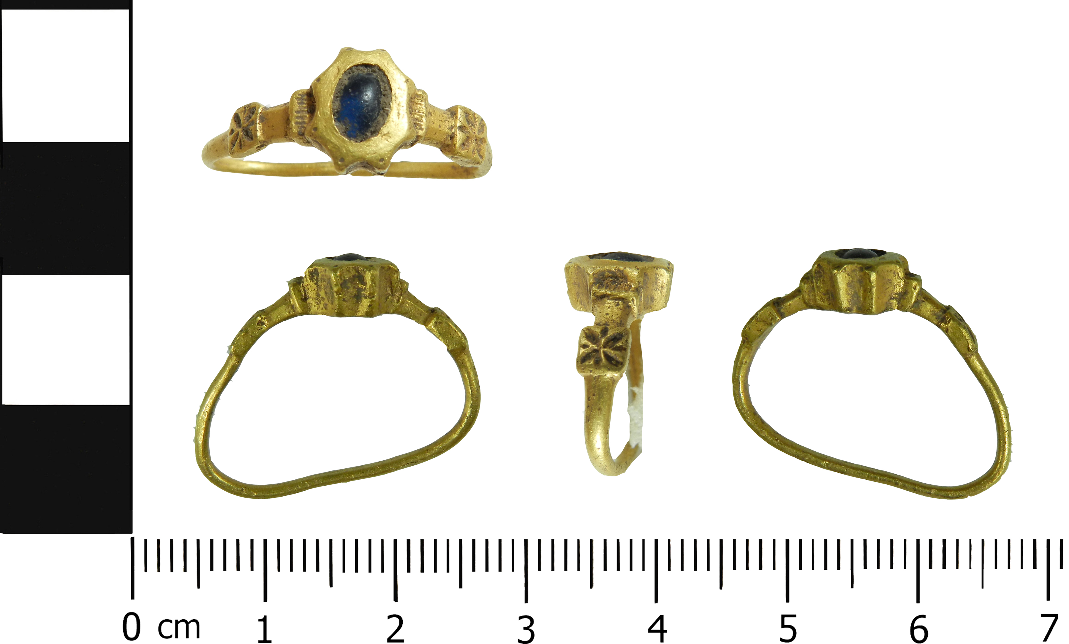 Gold and cobalt blue glass finger ring dating to the 14th century.