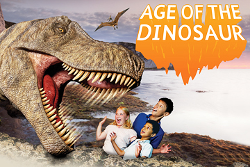 A group of children screaming near to the open mouth of a dinosaur against a prehistoric background