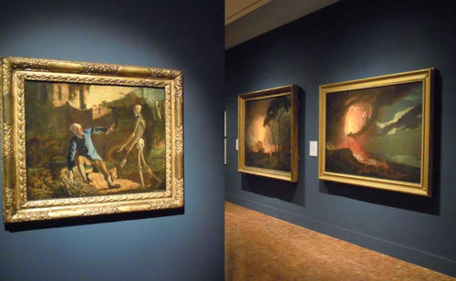 paintings on display in an exhibition