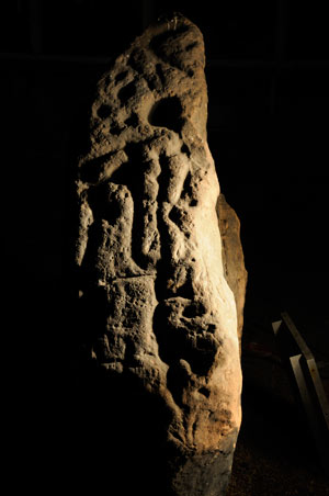 ancient carvings on a large stone