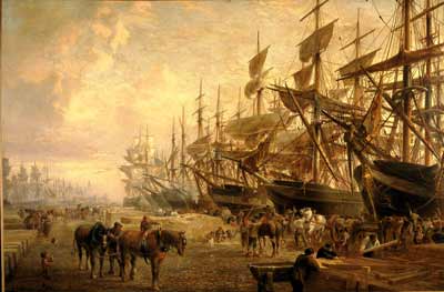 oil painting showing sailing ships tied at a busy dockside, with men and horses loading and unloading cargo.
