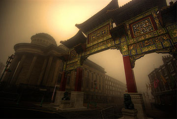 Large Chinese arch in hazy yellow fog