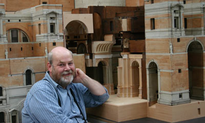 Conservator Chris Moseley with the partly-assembled cathedral model