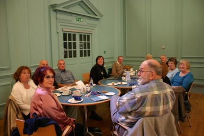 group of people sitting at cafe table