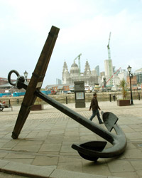 Large anchor on dockside