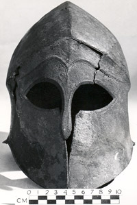grey metal helmet with eye holes and nose & cheek cover
