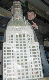 man with a model of the Empire State Building