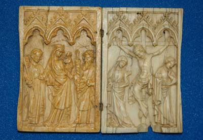Two ivory plaques side by side carved with meieval scenes