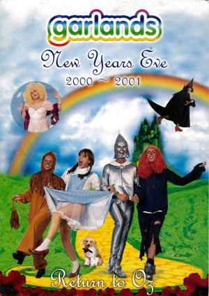 Garlands New Year's Eve poster with people dressed as Wizard of Oz characters