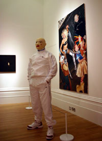 Gary Sollars in front of his painting in John Moores 24