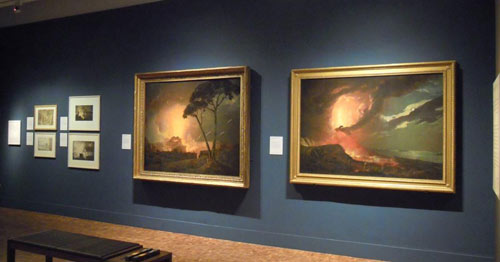 paintings on display in an exhibition