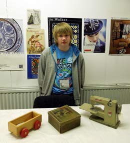 Work experience student with museum objects