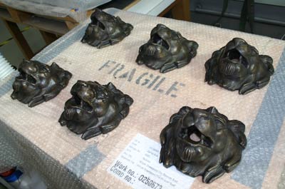 Six casts of a lion head from a Liverpool fountain