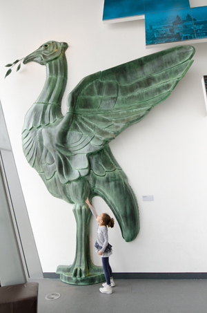 Girl and bird sculpture