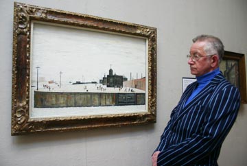 Man looking at Lowry painting