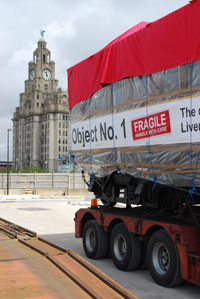 overhead railway carriage on the back of a lorry at the Pier Head by the Museum of Liverpool