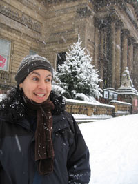 Woman in the snow in front of the Walker Art Gallery