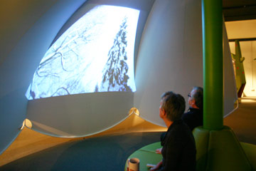 Annie watching a winter scene from the Plantastic! film