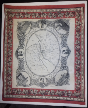 Printed silk hankerchief showing a map of Liverpool surrounded by images of notable places and people, including Samuel Plimsoll