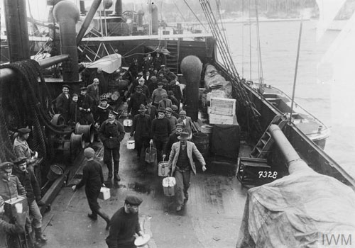 men on the deck of a ship