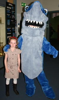 Big furry shark with a little girl