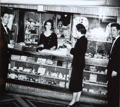Black and white photo of people in a shop