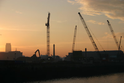 sunrise over the cranes constructing the Museum of Liverpool 