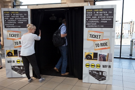 Visitors immerse themselves in the Ticket to Ride display.