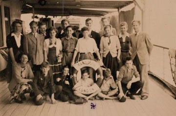 old group photo of boys on the deck of a ship