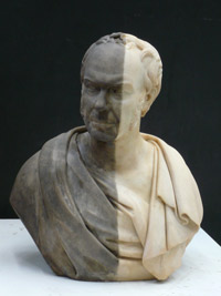 Half cleaned marble bust of William Brown