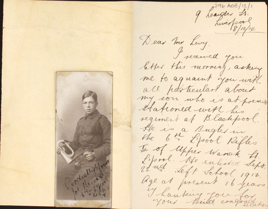 Photo of a young man in uniform with a hand written letter