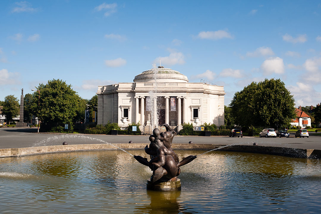 fountain in front of the neoclassical Lady Lever Art Gallery building