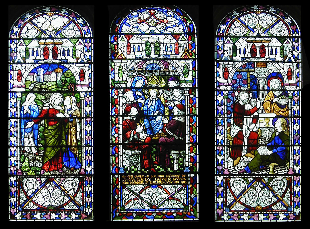 Stained glass window in 3 panels with bible scenes