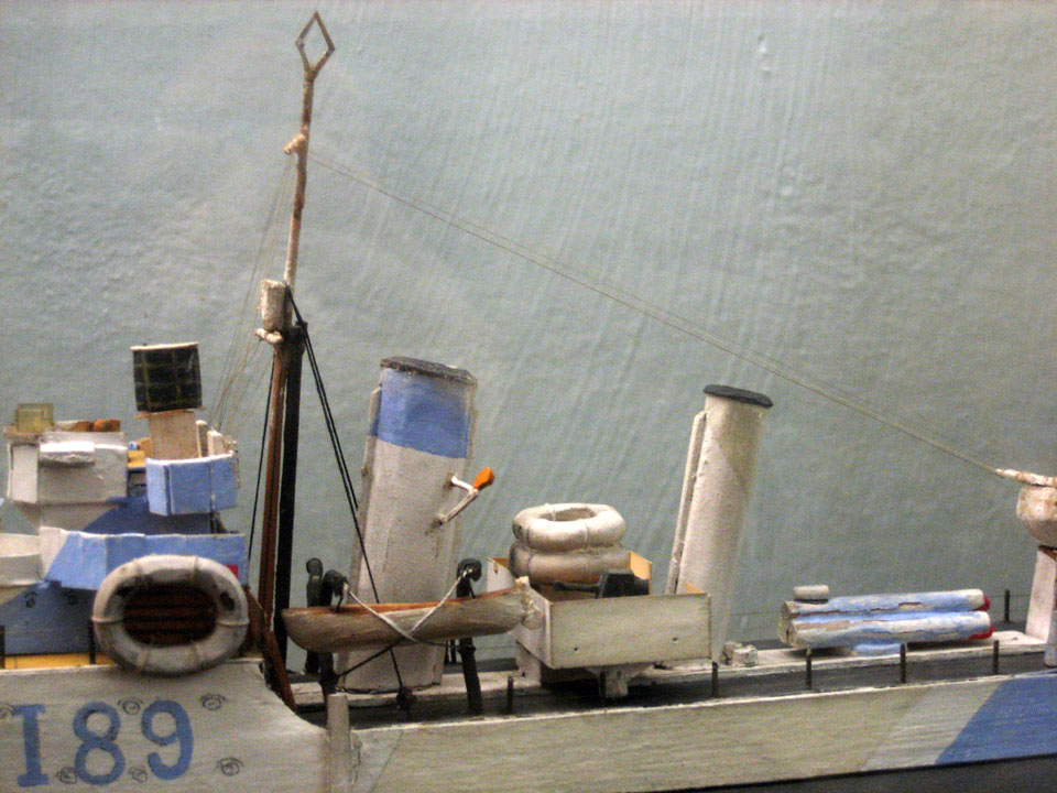 detail of ship model with hair used as rigging