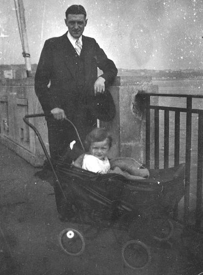 man with baby in a pram