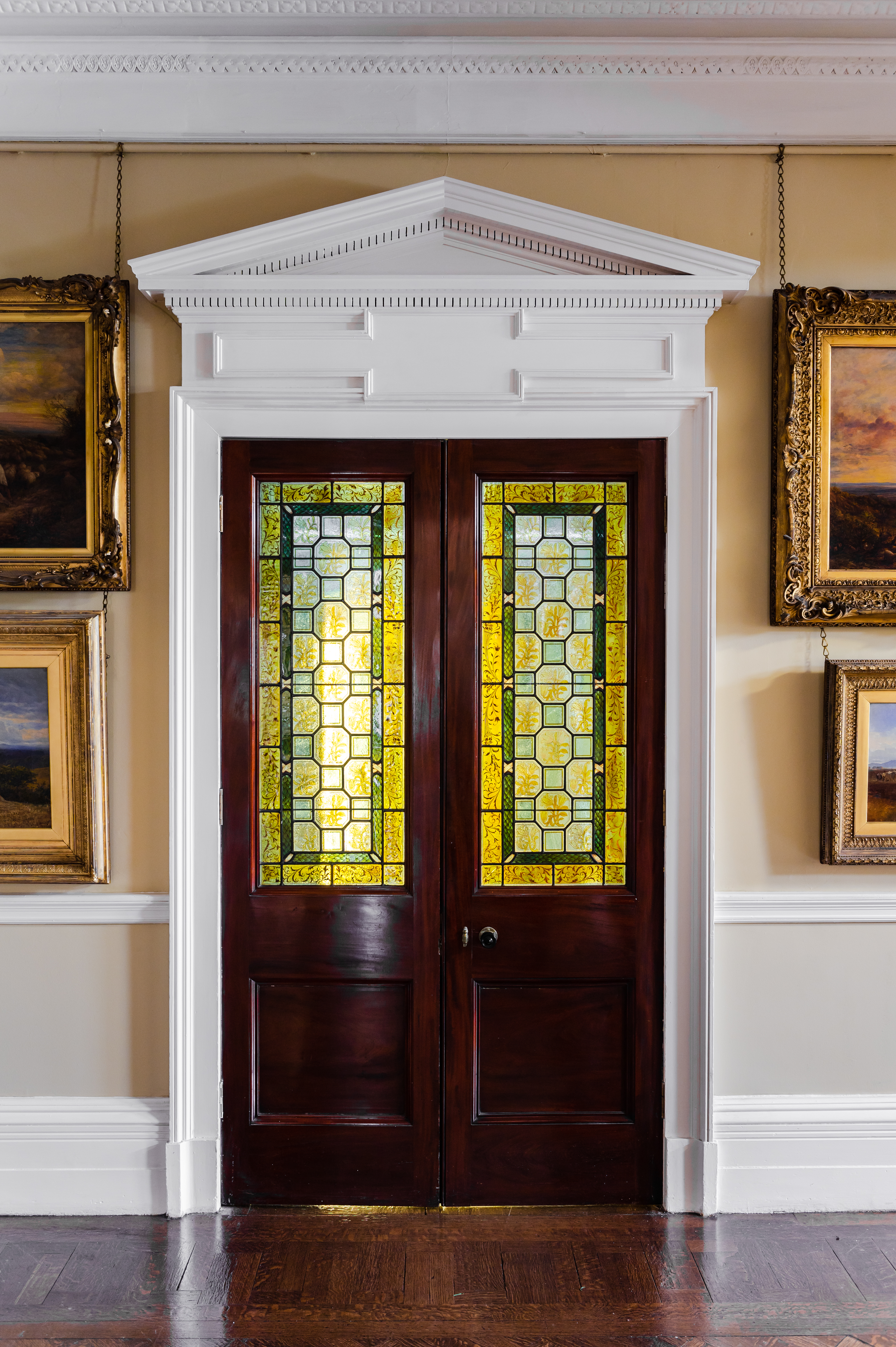 Entrance hall doors, yellow and green stained glass