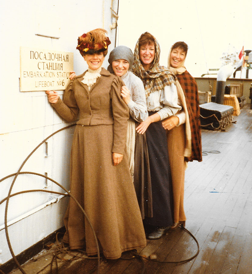 Andi Solomon, Leonie Bracey, Hillary and Miriam Swerdlow in costume on board a Mersey Ferry as extras in the movie Yentl. © Michael Swerdlow